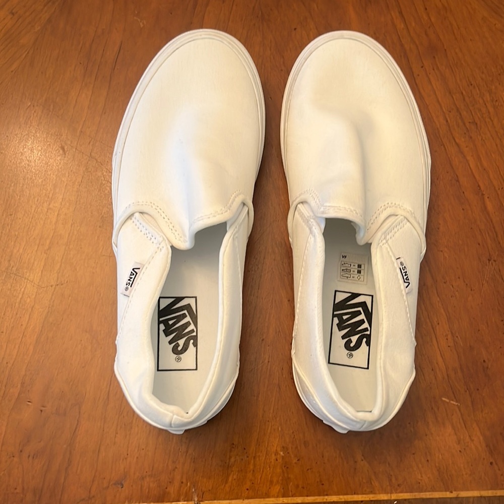 Never worn white vans perfect condition.